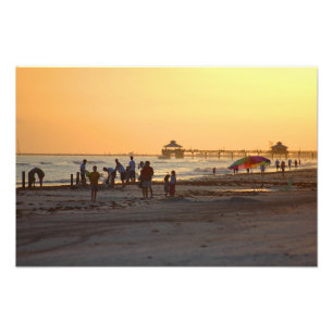Zonsondergang bij het oceaanstrand foto afdruk