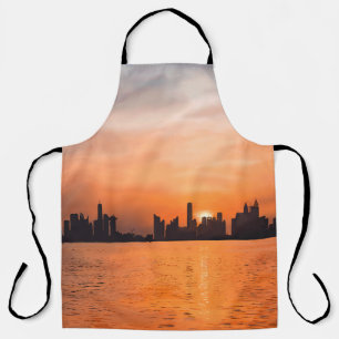 Zonsondergang boven een badplaats - waterverf schort