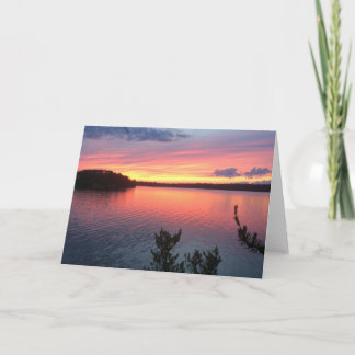 Zonsondergang boven het meer kaart