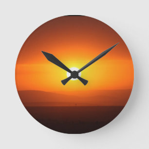 zonsondergang ronde klok