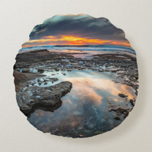 Zonsondergang vanuit de getijdenpoelen rond kussen