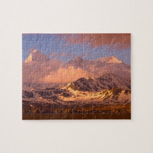Zonsopgang boven de bergketens in het zuiden legpuzzel