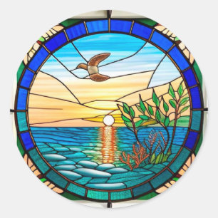 Zonsopgang boven de oceaan met vliegende vogel ronde sticker