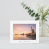 Zonsopkomst over bevroren rivier met windmolens en briefkaart (Staand voorkant)