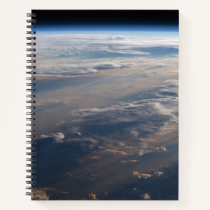 Zonsopkomst werpt lange schaduw over Filipijns Zee Notitieboek