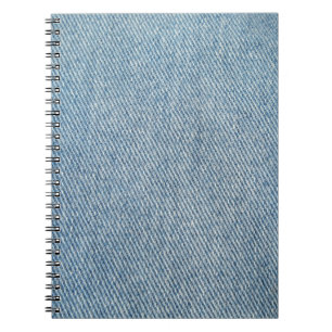 Zure wassen blauwe jeans, denim textuur. notitieboek