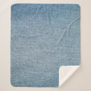 Zure wassen blauwe jeans, denim textuur. sherpa deken