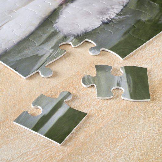 Zwangwesp in zwart-wit en cygnets in water. legpuzzel (Zijkant)