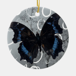 Zwart-blauwe vlinder op zilveren grond met cirkels keramisch ornament