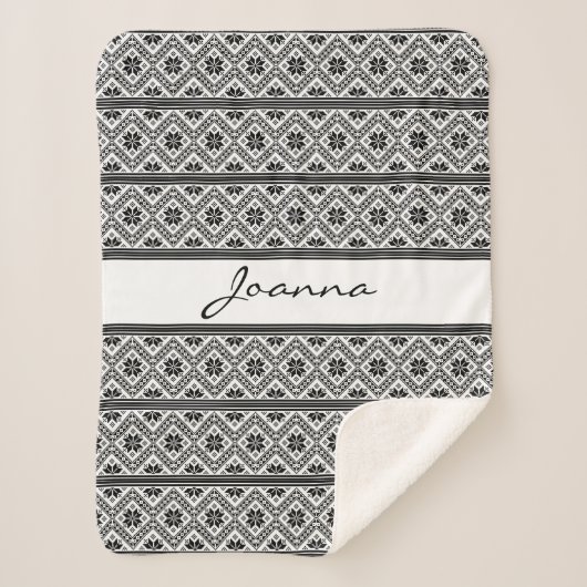 Zwart borduurwerk sherpa deken (Voorkant)