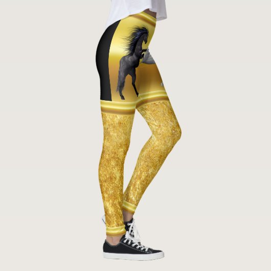Zwart en een wit paard dat vecht leggings (Rechts)