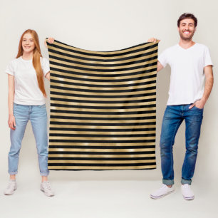 Zwart en goud gestreepte fleece deken