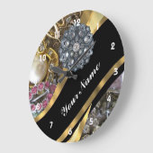 Zwart en goudverven grote klok (Hoek)