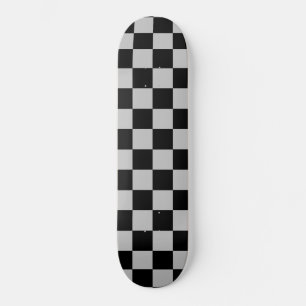Zwart en grijs geplakt skateboard