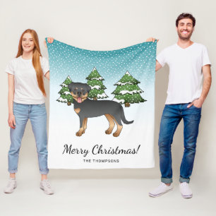 Zwart-en-roodbruine Rottweilerhond in een winterbo Fleece Deken