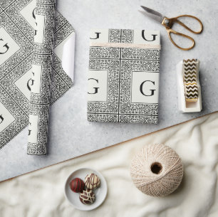 Zwart geometrisch en crème monogram cadeaupapier