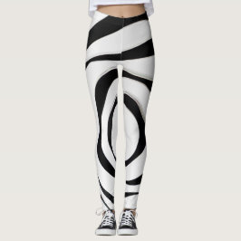 Zwart geometrisch spiraalvormig ontwerp op witte a leggings