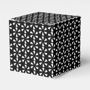 Zwart geschenk met witte sneeuwster bedankdoosjes