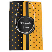 Zwart-gouden gele pokadot medium cadeauzakje (Voorkant)
