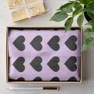 Zwart hart op lavendeweefselpapier tissuepapier