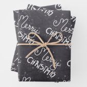 Zwart karton wit script kerst inpakpapier vel (In situ)