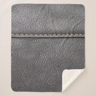 Zwart leder met witte rok sherpa deken