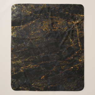 Zwart marmer, gouden aderen, textuur. sherpa deken