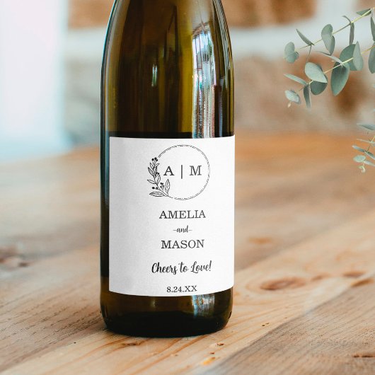 Zwart Minimaal Bloemmonogram Huwelijk Wijn Etiket