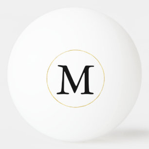 Zwart monogram met goudcirkel pingpongballen