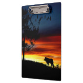 Zwart silhouet van Wolf, vogels en bomen in de zon Klembord (Links)