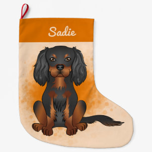 Zwart & Tan Cavalier King Charles-hond op oranje Grote Kerstsok