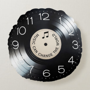 Zwart vinyl album met muziekquote rond kussen