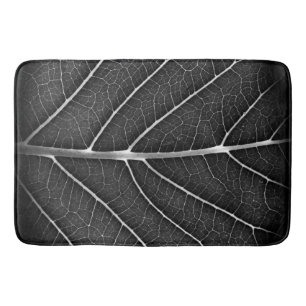 Zwart-wit gloeiend blad close-up badmat