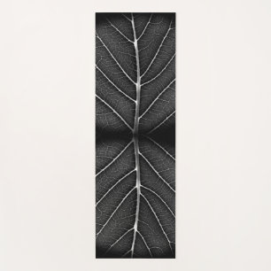 Zwart-wit gloeiend blad close-up yogamat