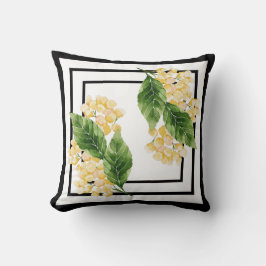 Zwart-wit kussen met gele bloemen