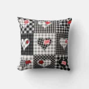 Zwart wit patchwork harten naadloos. kussen