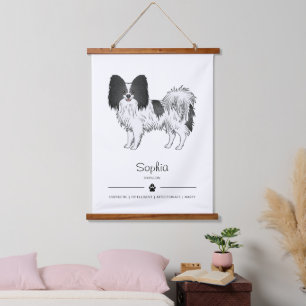 Zwart-witpapier met een twitteklare hond met aange hangend wandkleed