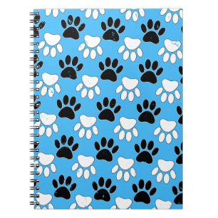 Zwart-witte en rode vlekken op blauwe achtergrond notitieboek