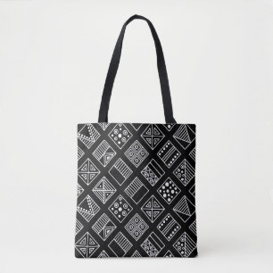 Zwart-witte geometrische achtergrond met hand d draagtas