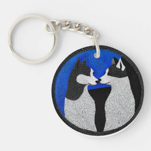 Zwart-witte honden sleutelhanger