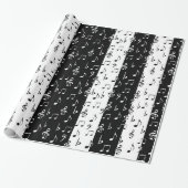 Zwart-witte muziekstrips cadeaupapier (Uitgerold)