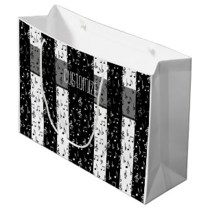 Zwart-witte muziekstrips met grote cadeautas