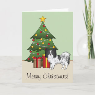 Zwart-Witte Papillon Hond Bij Een Kerstboom Kaart