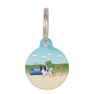Zwart-Witte Papillon Met Agility-Apparatuur Huisdierpenning