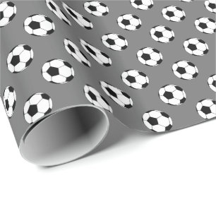 Zwart/witte voetbalballen op grijs cadeaupapier