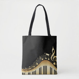 Zwarte achtergrond en gouden muzieknoten tote bag