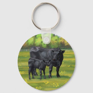 Zwarte Angus-Koe en Cute Calf in zomerperiode Sleutelhanger