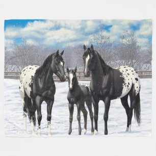 zwarte appaloosa-paarden in sneeuw fleece deken