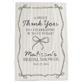 Zwarte Coquette Bow Beige Vrijgezellenfeest Favori Medium Cadeauzakje (Achterkant)