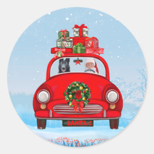 Zwarte Duitse Herdershond in auto met kerstman Ronde Sticker